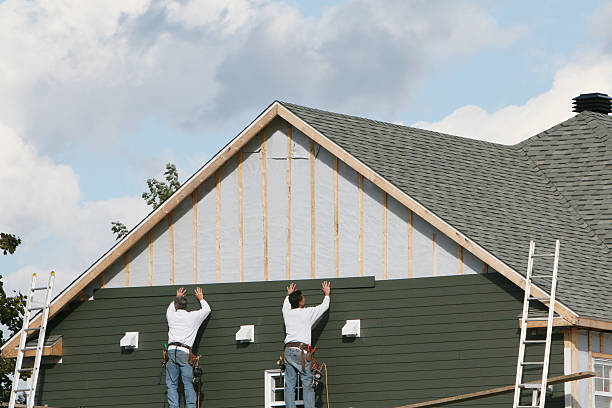 Professional Emergency Siding Repair technician working in USA
